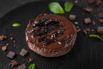 Chocolate cake with prunes and mint. Assorted Confectionery Range.