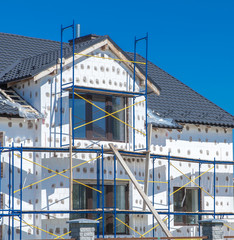 exterior insulation of building facade and walls under construction
