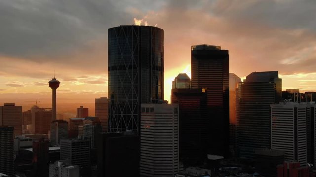 Aerial Drone Shot of City Skyscrapers at Sunset, Calgary Downtown City Skyline, Alberta Canada. Oil and Gas City 