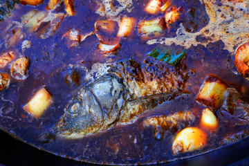 Fototapeta na wymiar Chinese cuisine cooking - Large pot stewed fish