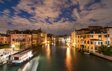 View of the Grand Canal with Vaporetto stop Venice at evening, Italy.