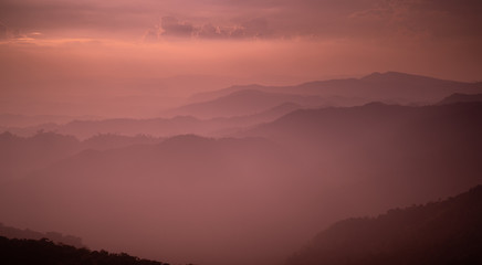 Fototapeta na wymiar sunset above mountain layer 