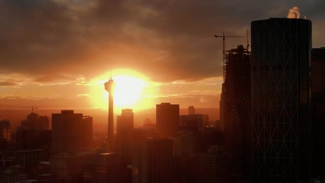 Aerial Drone Shot of Calgary Downtown Skyline at Sunset, Close up on Calgary Tower, Alberta Canada. Oil and Gas city. 