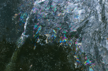 rainbow cracks on the ice-background image