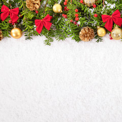 Naklejka na ściany i meble Christmas border with traditional decorations on the snow square