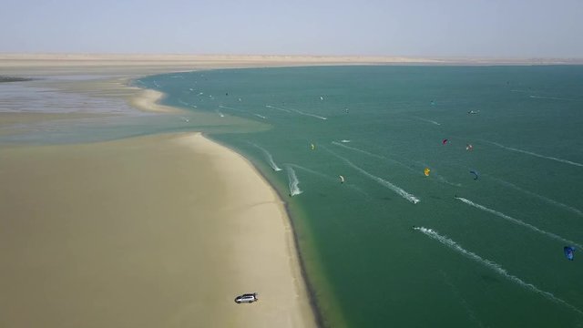Drone footage of dozens of kite surfers in Dakhla, Morocco