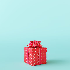 Red gift box on pastel blue background. 3d rendering