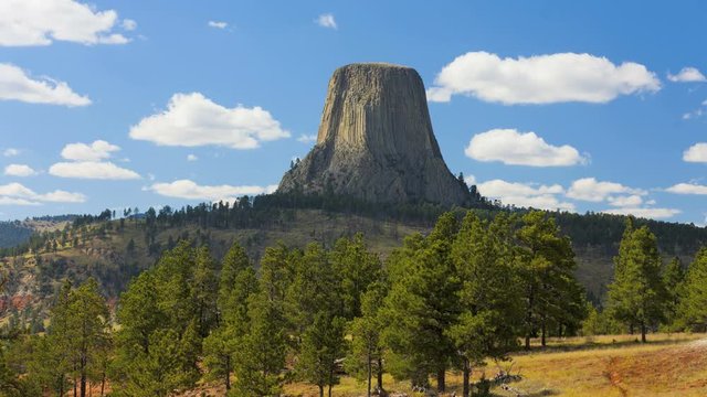Time lapse sunrise view of Devils Tower USA Wyoming a National Monument Mountain Black Hills famous for the film Close Encounters 