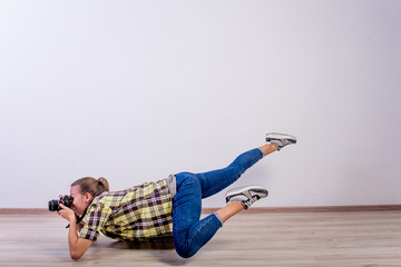 different photographer poses: bending, squatting, lying down