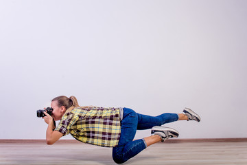 different photographer poses: bending, squatting, lying down