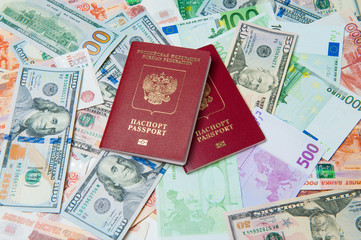 Passport and money. Travel expenses concept uncropped on white background. Money from different countries.