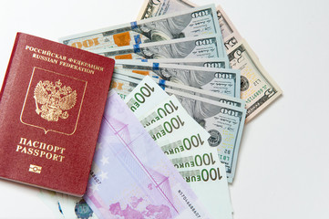 Passport and money. Travel expenses concept uncropped on white background. Money from different countries.