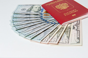 Fototapeta premium Passport and money. Travel expenses concept uncropped on white background. Money from different countries.