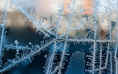 beautiful frosty patterns on glass