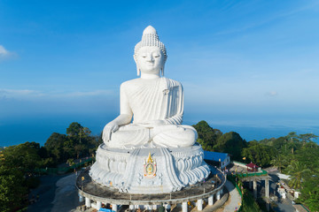 Big buddha over high mountain in Phuket thailand Aerial view drone shot