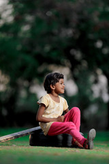 Naklejka premium poor indian girl child