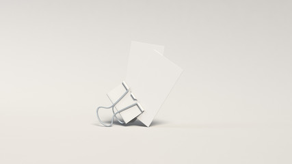 Fototapeta na wymiar Two white business cards in paper clip