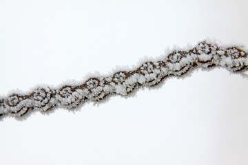 metal chain in the frost and snow