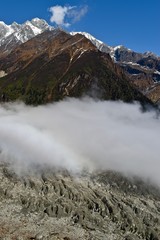 Clouds touching the No. 1 Glacier in Hailuogou, Sichuan, China.  