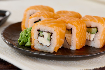 Philadelphia Maki Sushi made of Fresh Raw Salmon, Cream Cheese and Cucumber