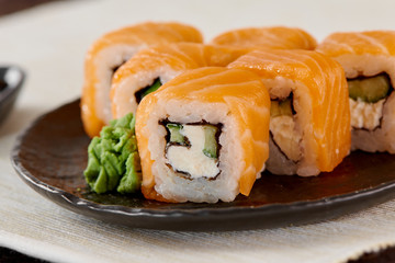 Philadelphia Maki Sushi made of Fresh Raw Salmon, Cream Cheese and Cucumber