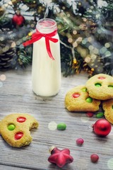 Shortbread cookies with multi colored candy and chocolate chips, served with glass of milk, square...