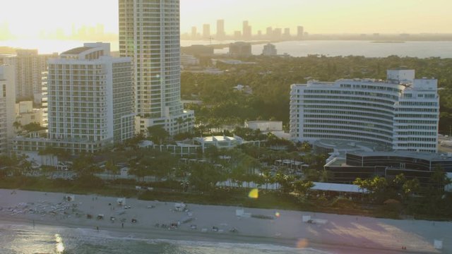 Aerial sunset view of the Waterfront Fontainebleau Hotel Resort Mid Beach Atlantic ocean Miami Florida USA 
