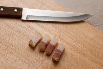 lardand knife on a wooden board