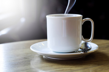 Hot coffee with soft light in the morning.
