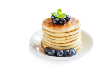 Pancakes with blueberries isolated