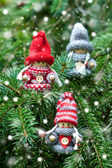 Cute christmas gnome dressed in knitted clothes