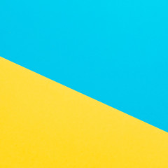 Blue and yellow geometry texture background. Flat lay. Top view