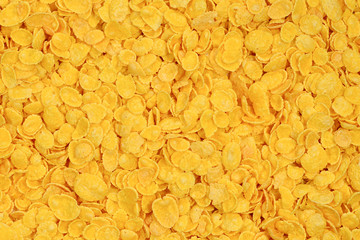 Corn-flakes background and texture. Top view. cornflake cereal box for morning breakfast.