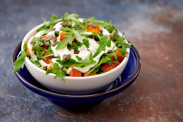 garden with pumpkin and arugula
