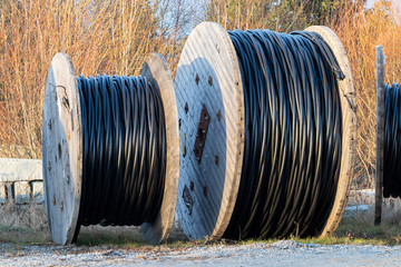 Two large electric cable reels