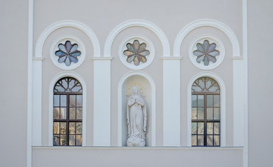 The statue above the entrance to the church Merciful Brothers in Pecs