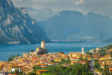 Beautiful Malcesine tourist resort and high mountains, lake Garda, Italy
