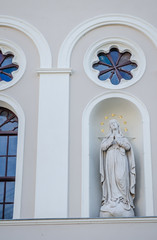 The statue above the entrance to the church Merciful Brothers in Pecs
