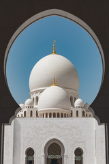 Fototapeta na wymiar View of the main entrance of the Sheikh Zayed Grand Mosque in Abu Dhabi
