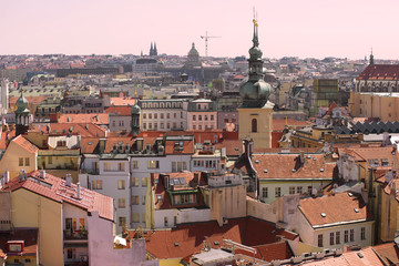 Fototapeta na wymiar April morning over the roofs of Prague. Czech Republic