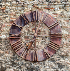 Rustic metal clock on the wall