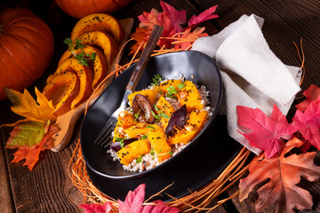 gratinated vegetarian pumpkin with barley groats, plums and thyme