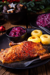 classic and crispy roasted duck with cabbage and dumplings