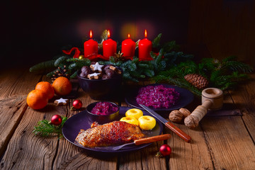 classic and crispy roasted duck with cabbage and dumplings