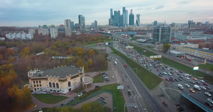 2018/10/27, Moscow, Russia. Flight over Moscow - Skyscrapers of Moscow, highway and railway. Aerial flights. UltraHD 4K