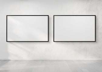 Two horizontal frames hanging on a wall mockup 3d rendering