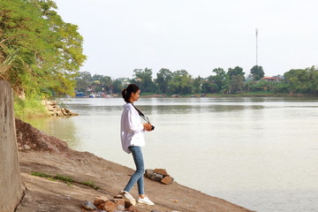 woman traveling to Ham Rong Bridge in Thanh Hoa, Vietnam