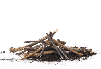 dry branches pile for fire on dirt isolated on white background