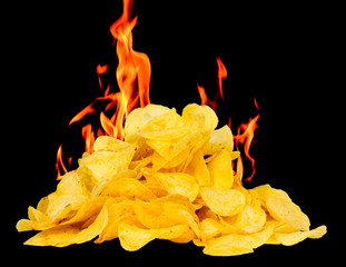 A bunch of chips on a background of flaming fire, spicy chips