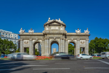 Fototapeta na wymiar Puerta de Alcala, famous spanish monument, on a sunny day. Madrid, Spain.